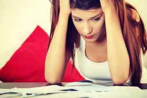 woman-stressed-out-personal-finance-and-debt